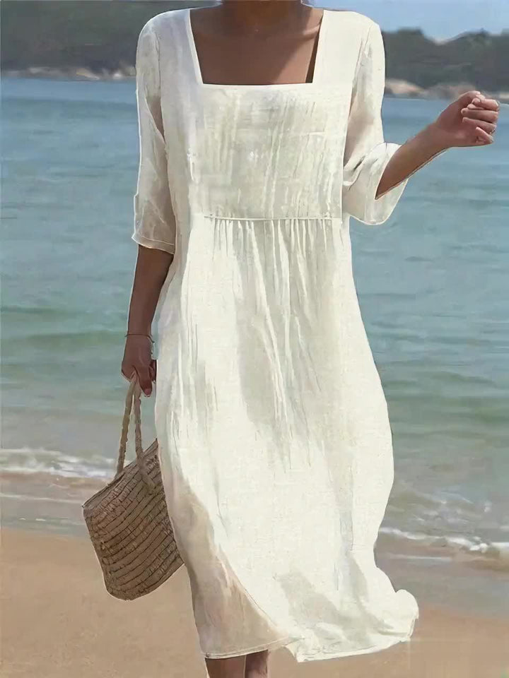 Soraya™ dress with front pleats and loose fit
